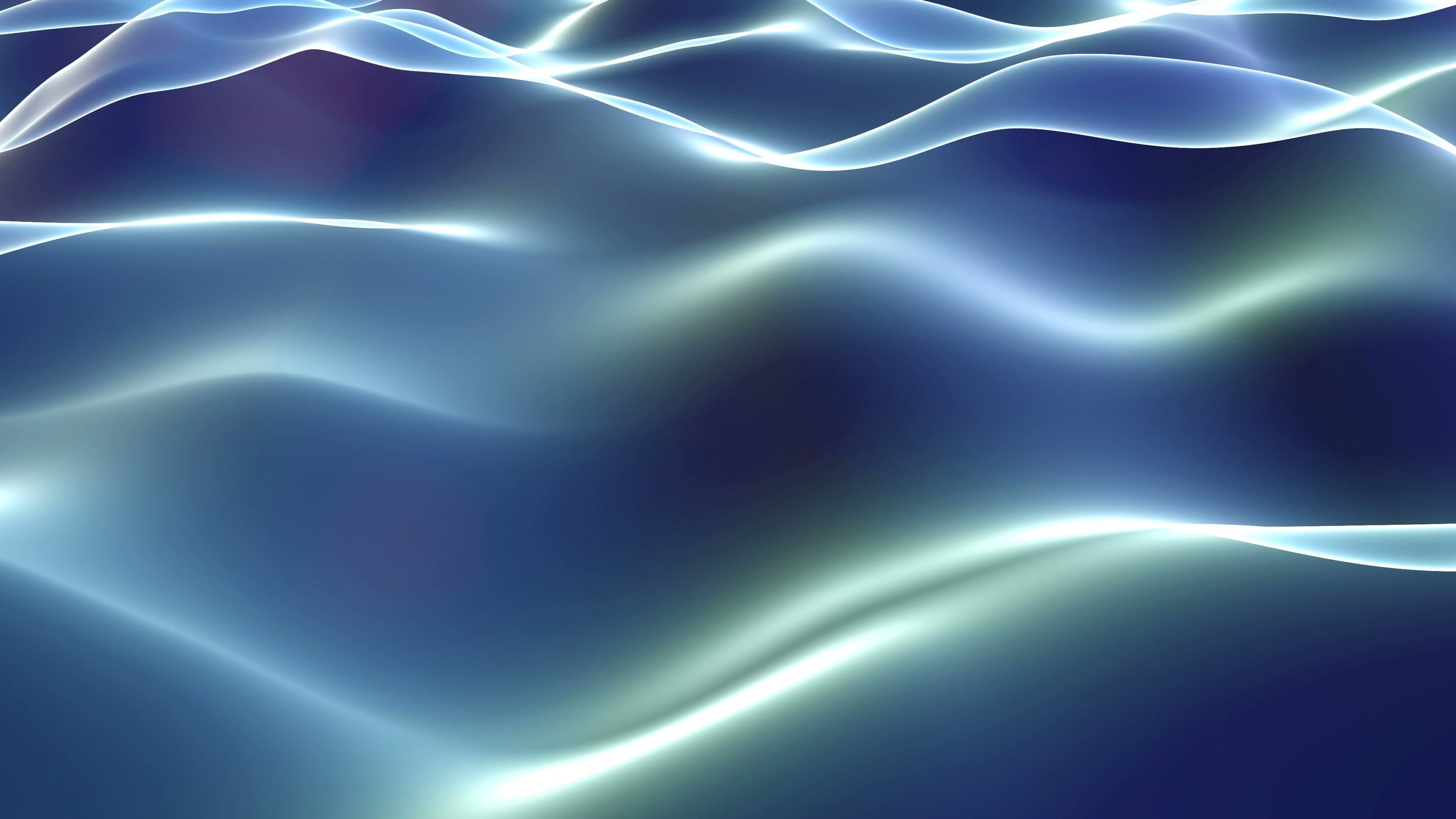 Glowing waves of light over deep blue